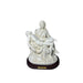 White Pietà statue featuring the Blessed Virgin Mary holding Jesus after the Crucifixion, displayed on a brown wooden base with a “Pieta” nameplate. Elegant Catholic devotional décor for home altars, prayer spaces, and memorial displays.