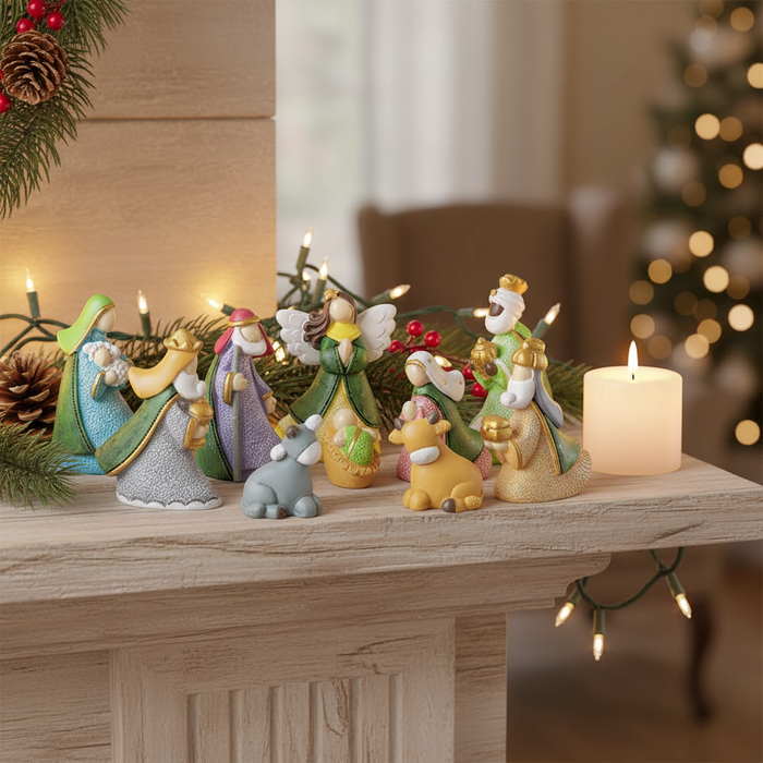 10-piece tiny pastel Nativity set displayed on a wooden mantel with warm Christmas lighting and evergreen sprigs
