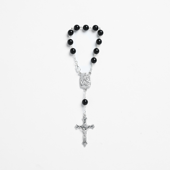 One decade St. Christopher car rosary with black beads, silver-tone links, clasp, St. Christopher centre and crucifix.